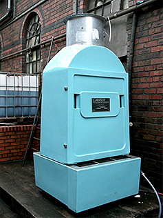GRP induced draught cooling tower with removable access door